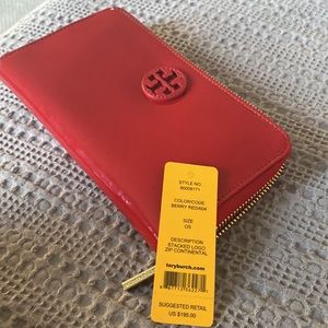 Tory Burch stacked logo zip continental wallet. Color/code is Berry Red/604.